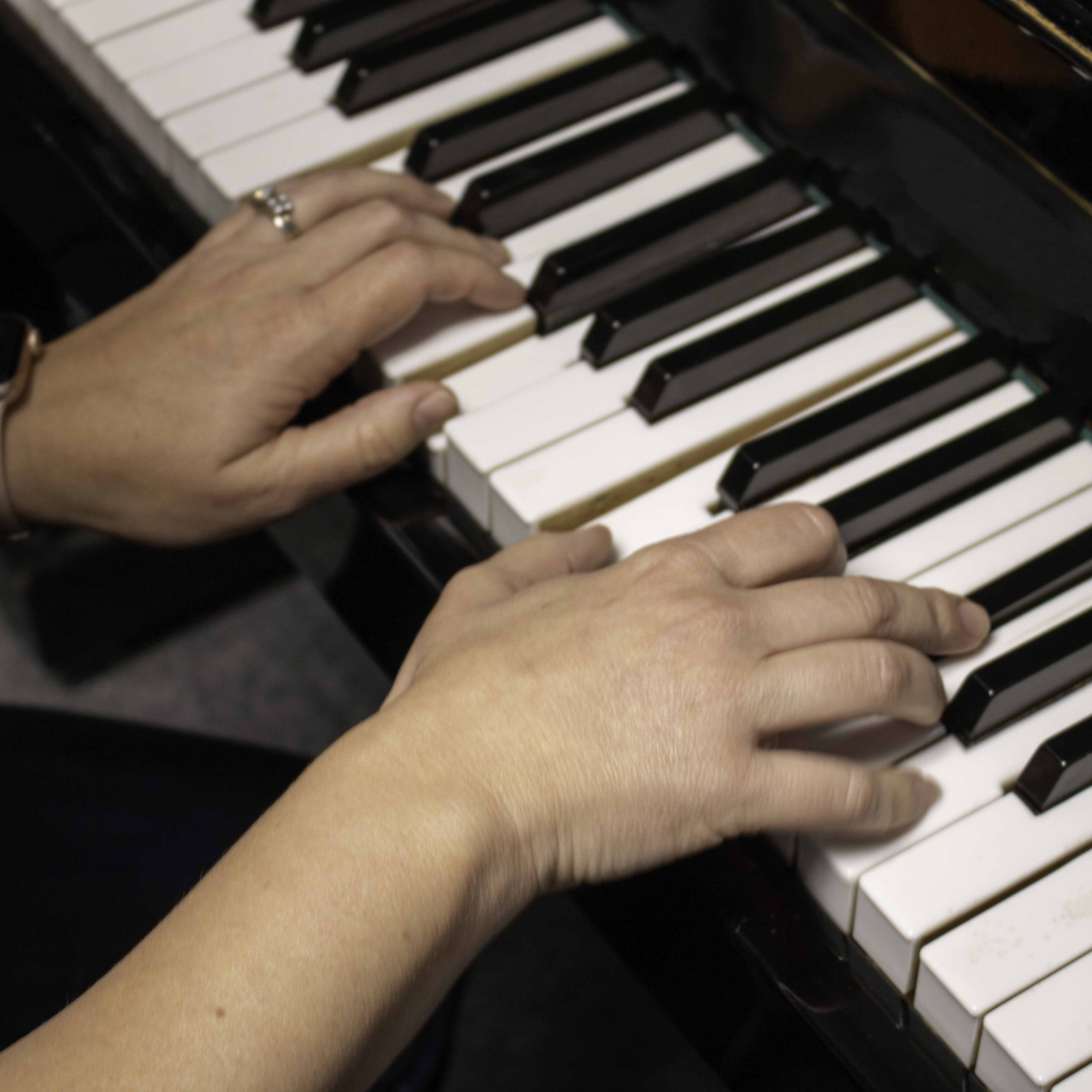 hands Playing Piano